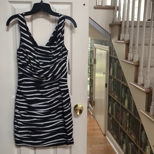 Flattering semi formal black & white striped dress